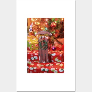 Christmas Sled with a Wreath on red presents under a Christmas tree Posters and Art